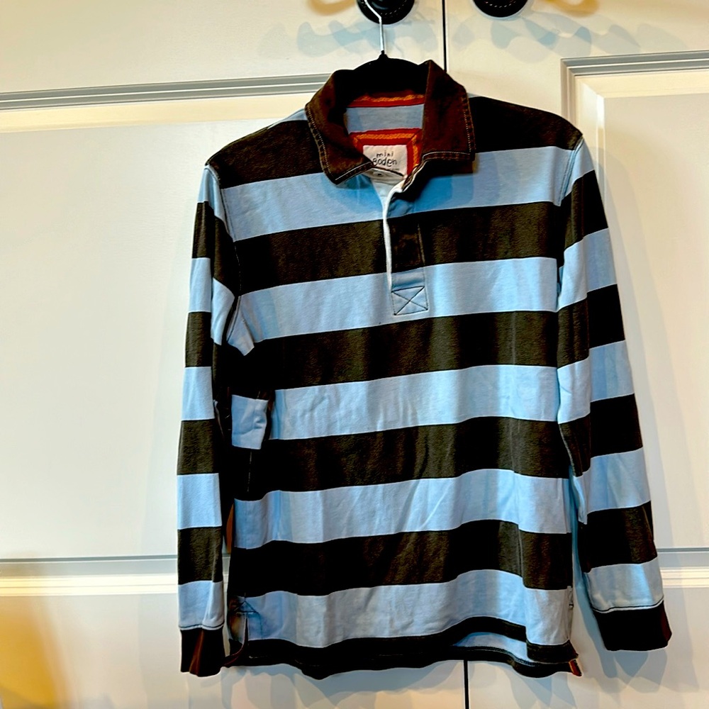 Mini-Boden boys rugby shirt - perfect condition. No signs of wear and tear.